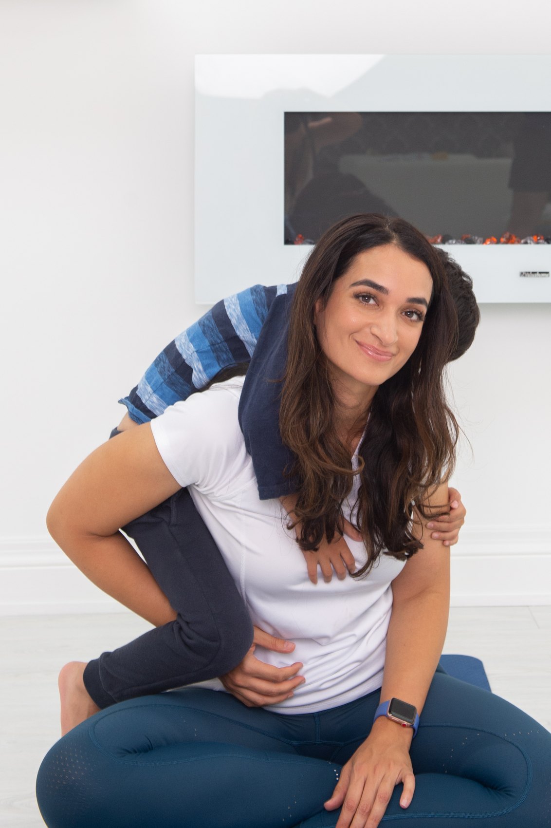 Salwa Qadir smiling during a candid family fitness moment